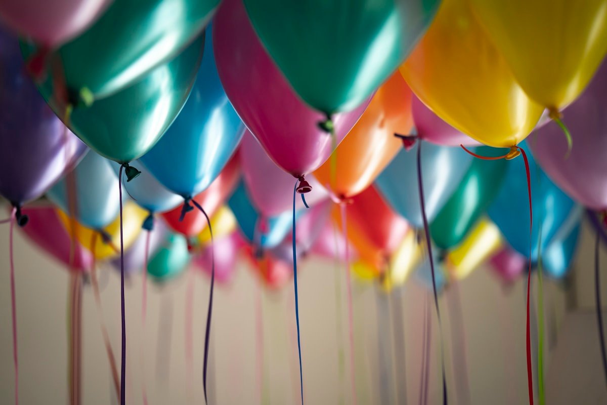 Birthday party balloon arch and styled tablescape